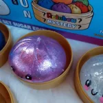 Metálos Glitteres világító Squishy Dumpling stresszoldó játék nagy