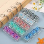 Világító Fidget Keychain Cube klikkelő stresszoldó billentyűzet kulcstartó 4 gombos
