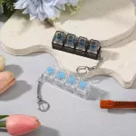 Világító Fidget Keychain Cube klikkelő stresszoldó billentyűzet kulcstartó 4 gombos
