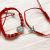 Piros , védelmező,  szerencse karkötő
