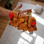 Capybara kulcstartó kihúzható gyümölcsökkel 