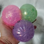 Glitteres fluoreszkáló foszforeszkáló Dumpling Squishy 