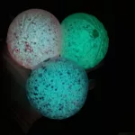 Glitteres fluoreszkáló foszforeszkáló Dumpling Squishy 