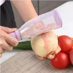Kézi hámozó, zöldséghámozó tartállyal